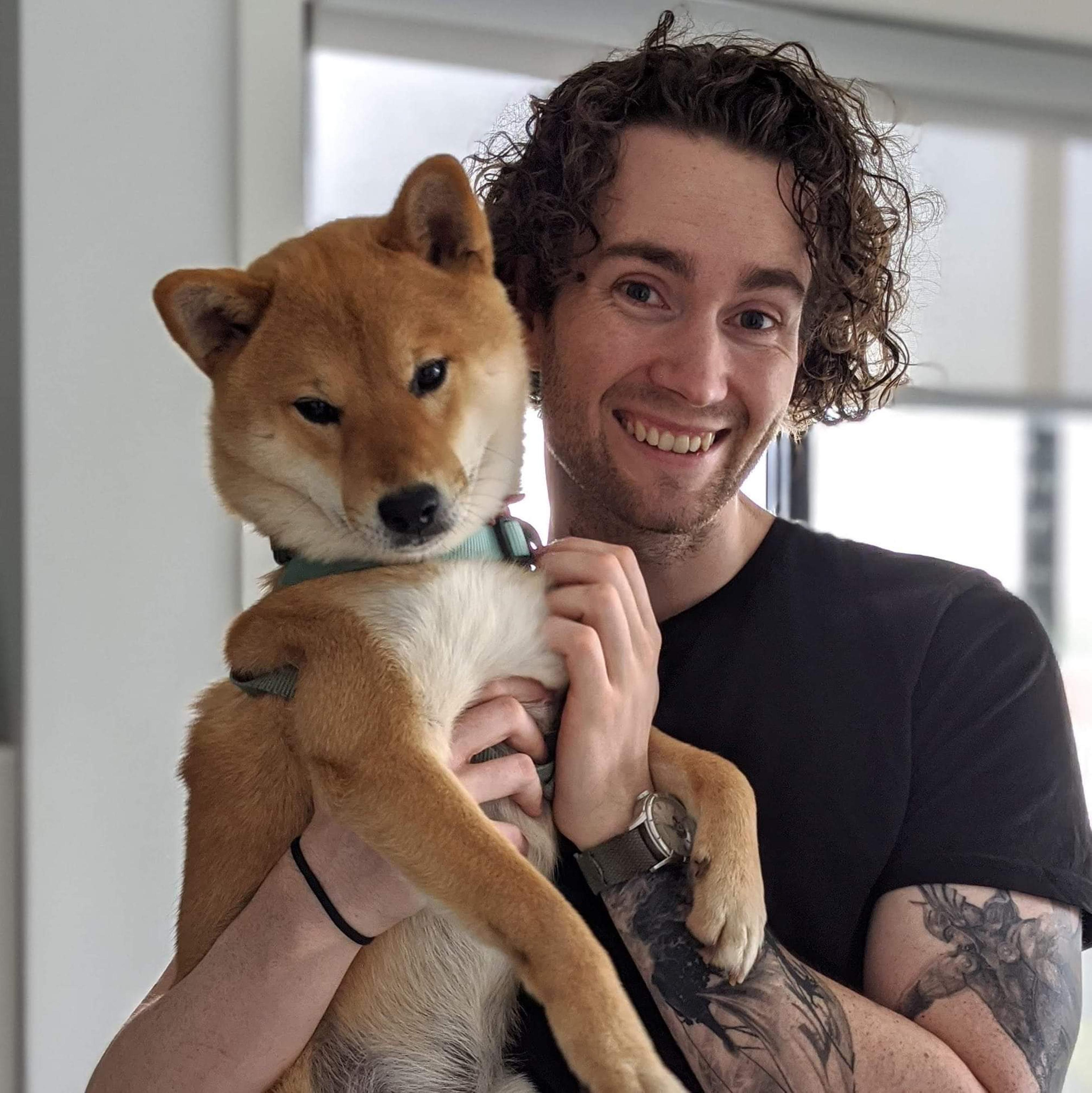 Site author holding his shiba